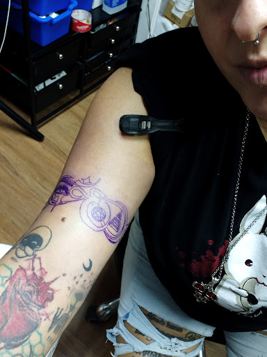 Explore snowboard tattoo ideas, creative tattoo ideas in Arlington, available at Tat2z4Life LLC Tattoos and Body Piercings BY ALMA