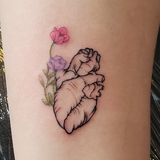 Find sunflower tattoo ideas for your next unique tattoo in Roseville at 13th Hour Tattoos