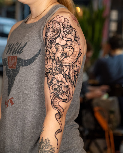 Explore rapper tattoo ideas, creative tattoo ideas in Vancouver, available at Hopeless Tattoo & Piercing