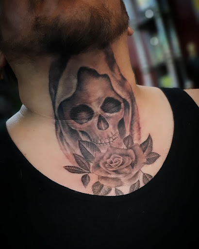 Explore falling in reverse tattoo ideas, creative tattoo ideas in Corcoran, available at La Raza Tattoo 2