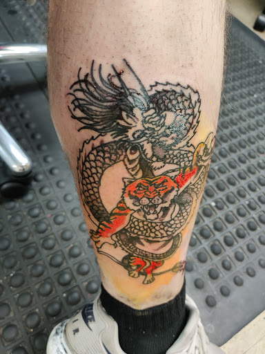 Explore strange tattoo ideas, creative tattoo ideas in Cranston, available at Kabloom Tattoo Studio