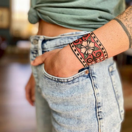 Explore resilience symbol tattoo ideas, creative tattoo ideas in Ironwood, available at Iron Ink Tattoos