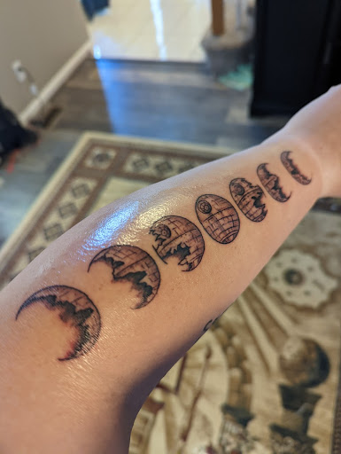 Explore forearm tattoo idea for men, creative tattoo ideas in Omaha, available at Ironwood Ink