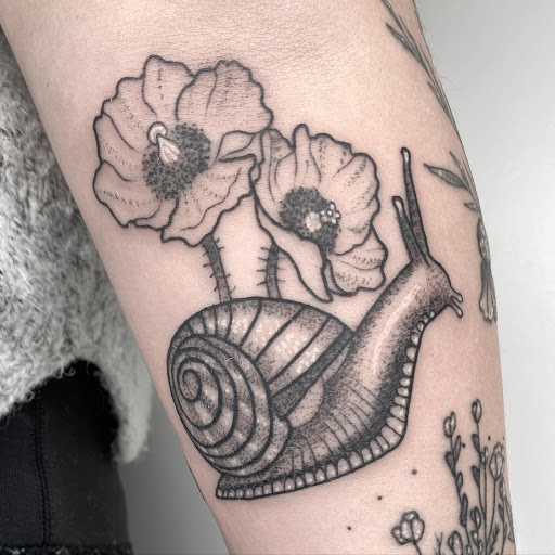 Find face tattoo idea for your next unique tattoo in Lancaster at MermGoddess Tattoo Studio & Gallery