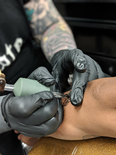 Explore tattoo ideas for son, creative tattoo ideas in Buffalo, available at True Gloom Tattoo Studio