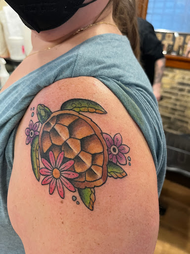 Find family symbol tattoo ideas for your next unique tattoo in Milwaukee at Solid State Tattoo