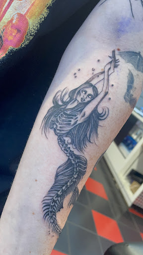 Explore mens ring tattoo ideas, creative tattoo ideas in Lakeland, available at Atomic Tattoos Lakeland