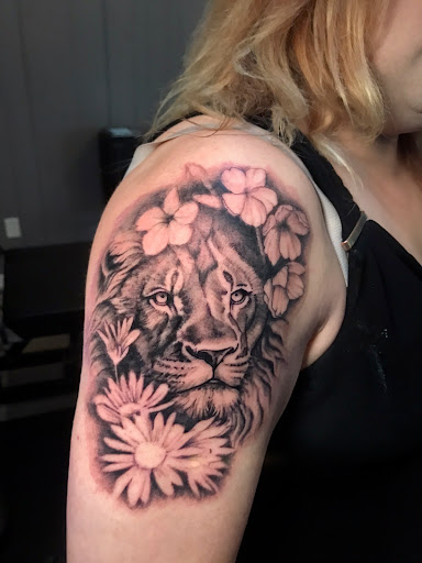 Explore back thigh tattoo ideas, creative tattoo ideas in Washington, available at Inktoxicating Tattoos