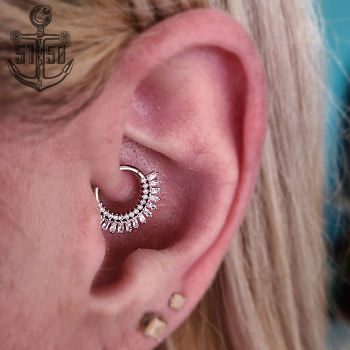 Explore ladies arm tattoo ideas, creative tattoo ideas in Kearney, available at Studio 5150 Piercing & Fine Jewelry