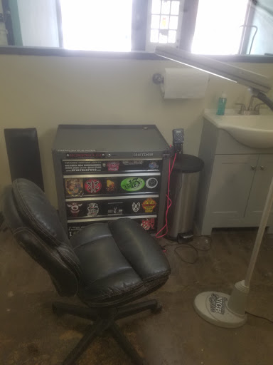 Explore tattoo ideas for top of leg, creative tattoo ideas in Georgetown, available at White Dog Tattoo