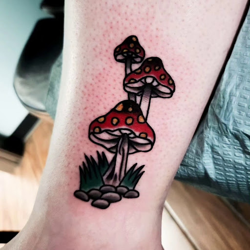 Explore stomach tattoo ideas for men, creative tattoo ideas in Calhoun, available at A Sailors Grave Tattoo Parlor