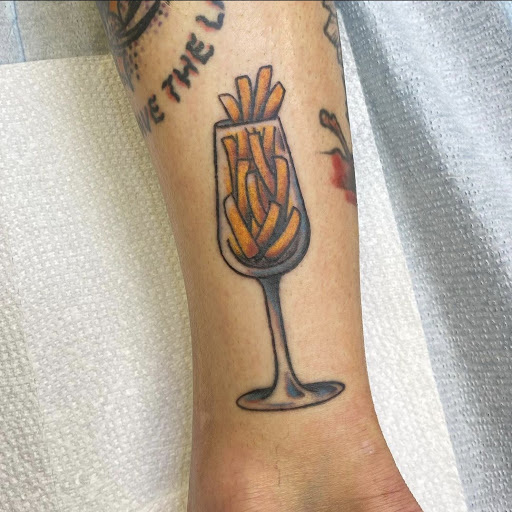 Explore trash polka tattoo ideas, creative tattoo ideas in Millsboro, available at Tattoo Galaxy (Millsboro) Piercing & Custom tattoos