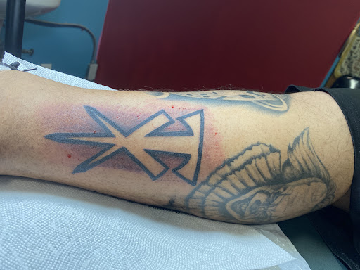 Explore flower back tattoo ideas, creative tattoo ideas in San Jose, available at Legacy Tattoo