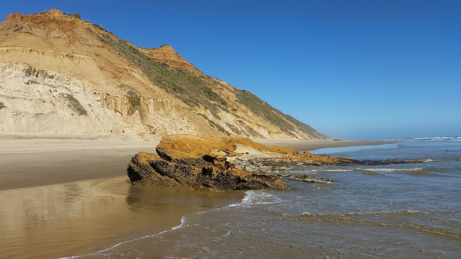 Omamari Beach'in fotoğrafı düz ve uzun ile birlikte