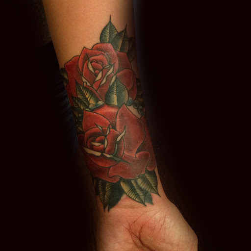 Explore tattoo ideas for women's lower back, creative tattoo ideas in Kingsford, available at Deft Tattoo Studio