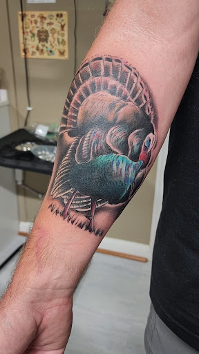 Explore angel forearm tattoo ideas, creative tattoo ideas in Columbus, available at Lions Mane Tattoo and Piercing