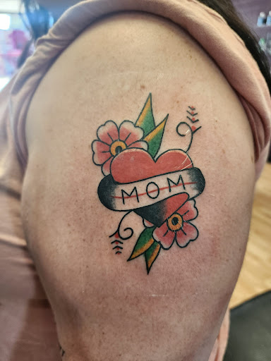 Explore tattoo ideas with writing, creative tattoo ideas in Independence, available at Odins Mark Tattoo and Emporium