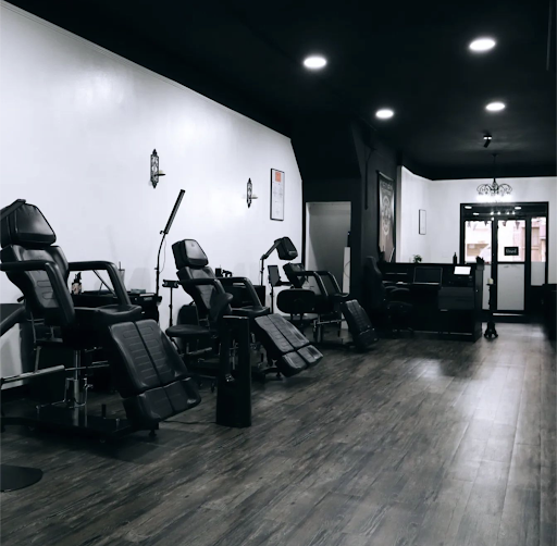 Explore back tattoo ideas for guys, creative tattoo ideas in Woodside, available at Fiction Tattoo Inc.