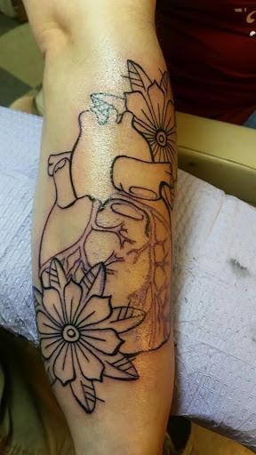 Tattoo Shop «Aardvark Tattoos & Body Piercing», reviews and photos, 125 N Clinton Ave, St Johns, MI 48879, USA