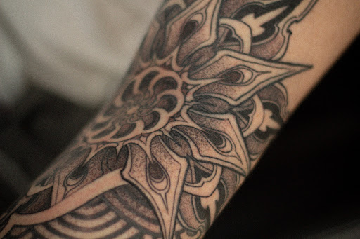 Explore viking tattoo sleeve ideas, creative tattoo ideas in Hudson, available at The Bohemian Social Club