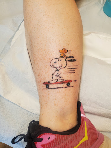 Explore tattoo ideas for thigh, creative tattoo ideas in Fayetteville, available at Keepsake Tattoo
