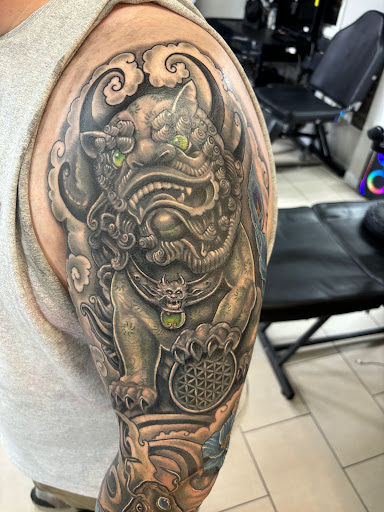 Explore skeleton hand tattoo ideas, creative tattoo ideas in Sarasota, available at SEVEN SINS Tattoo Studio