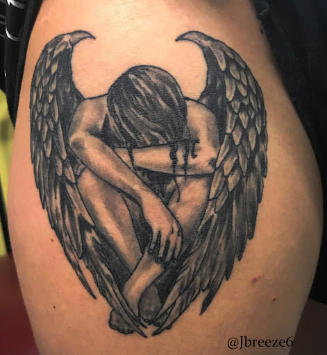 Explore cool texas tattoo ideas, creative tattoo ideas in Providence, available at F.I.N.A.O. Ink Tattoo Company