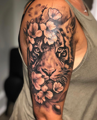 Explore black couple tattoo ideas, creative tattoo ideas in Dayton, available at Aisle 9 Tattoo