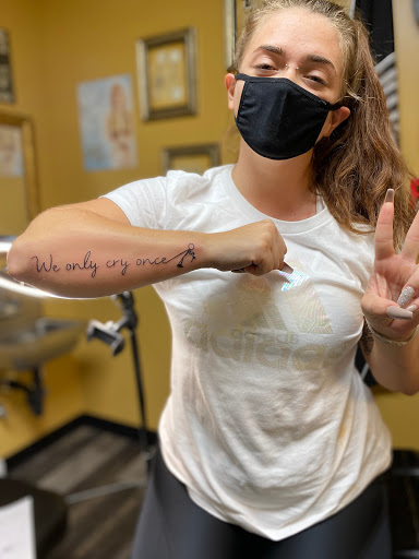 Explore cute neck tattoo ideas, creative tattoo ideas in Warner Robins, available at Untold Pain Tattoo Studio