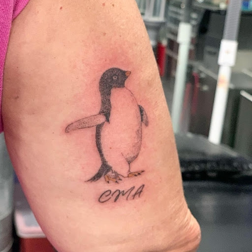 Explore flag tattoo ideas, creative tattoo ideas in Sarasota, available at Z-Edge Tattoo and Body Piercing North Shop