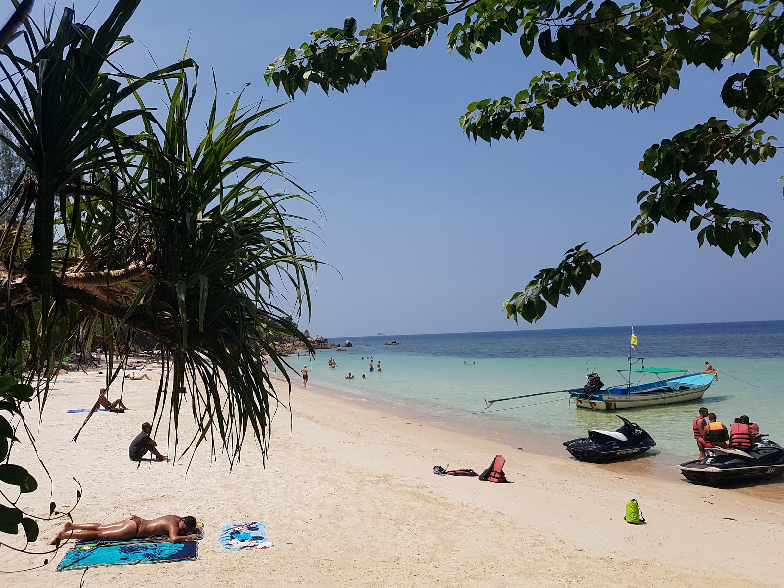 Foto van Secret Beach en de nederzetting