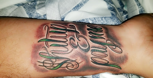 Explore green arrow tattoo ideas, creative tattoo ideas in Horn Lake, available at PureThirteen Tattoo Company