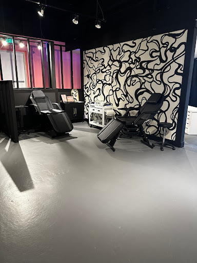 Explore behind the ear tattoo ideas for guys, creative tattoo ideas in Smithfield, available at Skin Haus