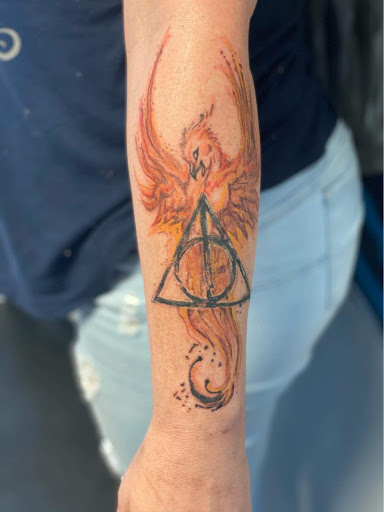 Explore black wolf tattoo ideas, creative tattoo ideas in Denver, available at Disruptive Ink Tattoos