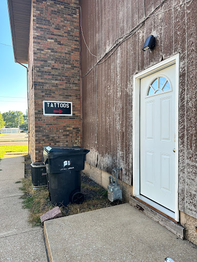 Explore cherry blossom tattoo ideas, creative tattoo ideas in Belleville, available at Cry Baby Tattoo Studio, LLC