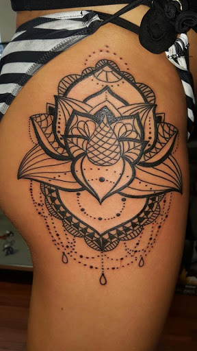 Find between breast tattoo ideas for your next unique tattoo in Tulia at Mister Placasos Tattoo Shop