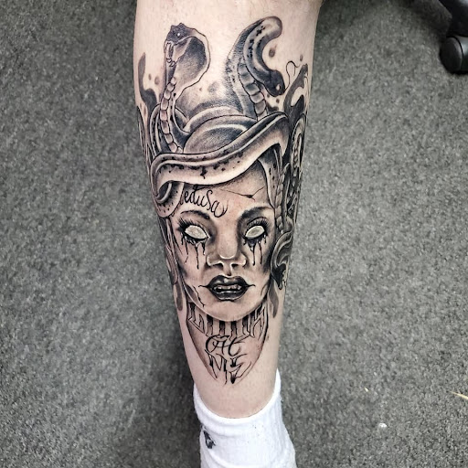 Explore men's neck tattoo ideas, creative tattoo ideas in Sumter, available at The Art Company llc