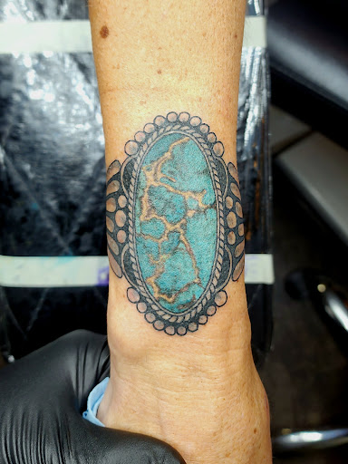 Explore feminine hand tattoo ideas, creative tattoo ideas in Sequim, available at Coastal Lines Tattoo Emporium