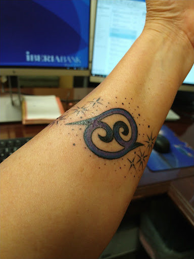 Explore singing tattoo ideas, creative tattoo ideas in Benton, available at Relics Tattoo Studio