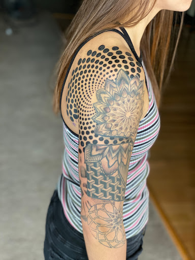 Explore small love tattoo ideas, creative tattoo ideas in Sauk City, available at The Madison Tattoo Company
