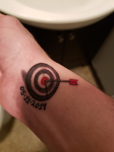 Explore dart tattoo ideas, creative tattoo ideas in Anchorage, available at Unique Ink AK