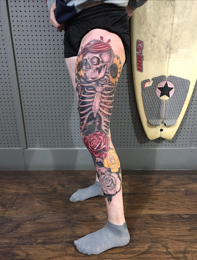 Explore religious tattoo sleeve ideas, creative tattoo ideas in Kingsford, available at Deft Tattoo Studio