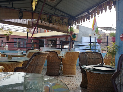 Om Café And Restaurant - 72WC+MW5, Backside Clock Tower, Way to Fort, Makrana Mohalla, Gulab Sagar, Jodhpur, Rajasthan 342001, India