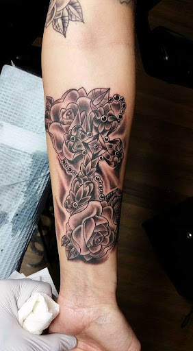 Explore female family tattoo ideas, creative tattoo ideas in Inman, available at Nine Lives Tattoo