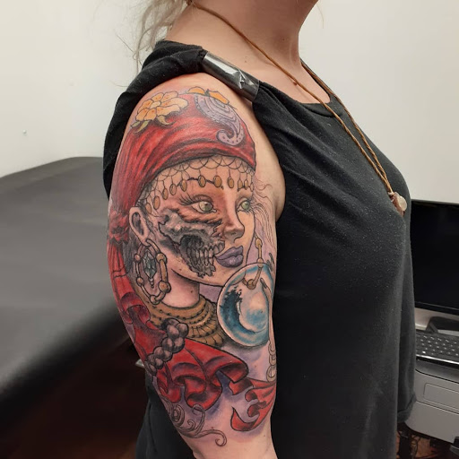 Explore tribal sun tattoo ideas, creative tattoo ideas in New Brunswick, available at Art & Tattoo Emporium