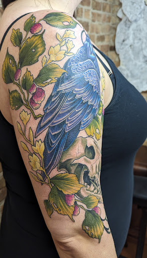 Explore girl thigh tattoo ideas, creative tattoo ideas in Crystal Lake, available at Dark Heart Tattoo