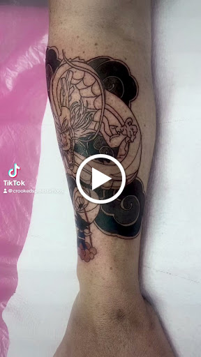 Explore marigold tattoo ideas, creative tattoo ideas in Lake City, available at Crooked Spines Tattoo Studio