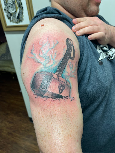 Find mom of 4 tattoo ideas for your next unique tattoo in Egg Harbor Township at The Inkuisition