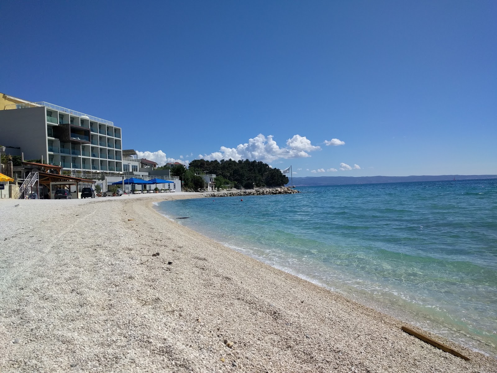 Fotografija Plaza Strozanac z lahki fini kamenček površino