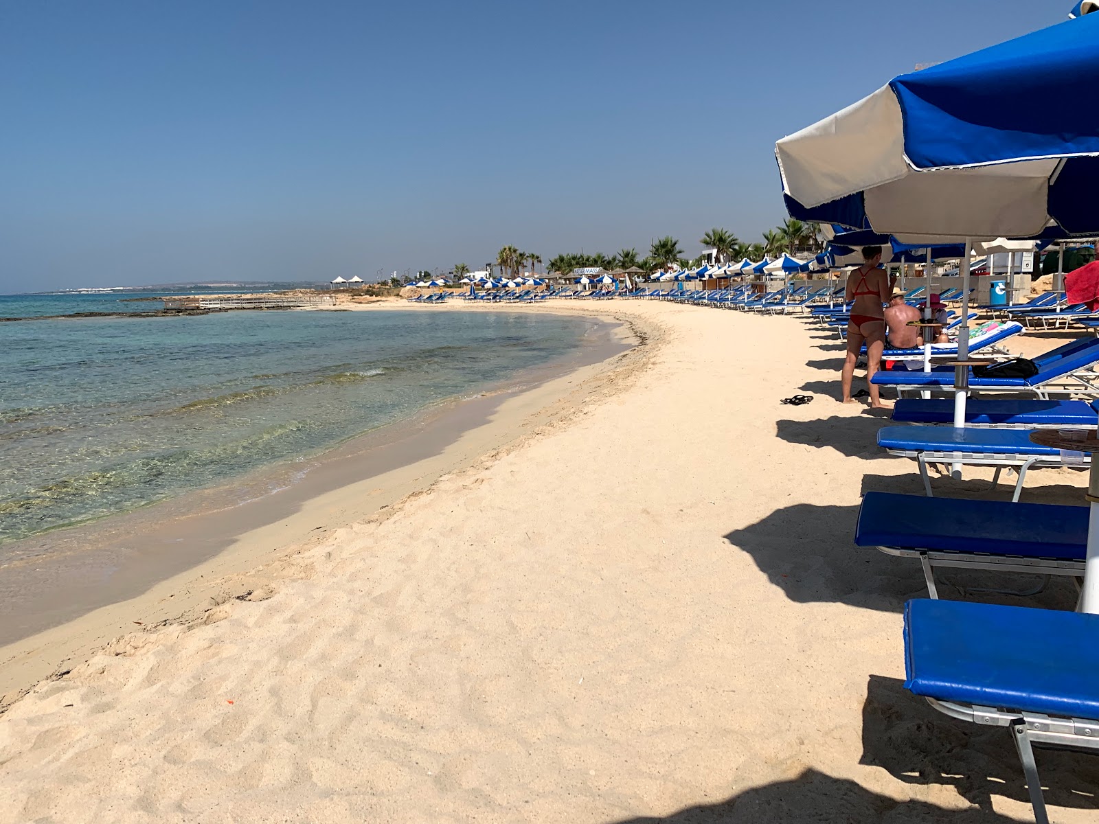 Zdjęcie Sirens beach z powierzchnią drobny beżowy piasek